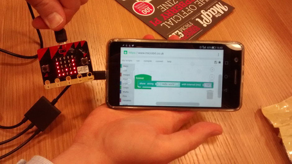 picture of a microbit being programmed via an android phone.